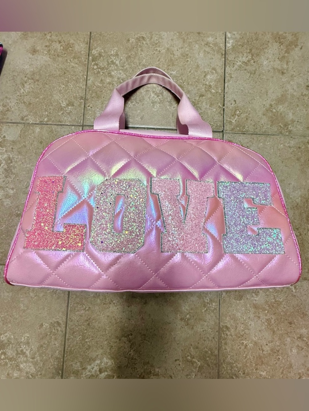 Miss Gwen’s omg accessories duffel bag